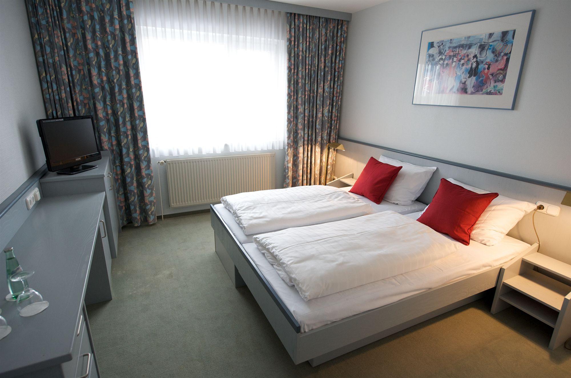 Hotel Good Morning + Bad Oldesloe Pokoj fotografie